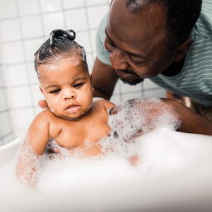 DadBathingBaby